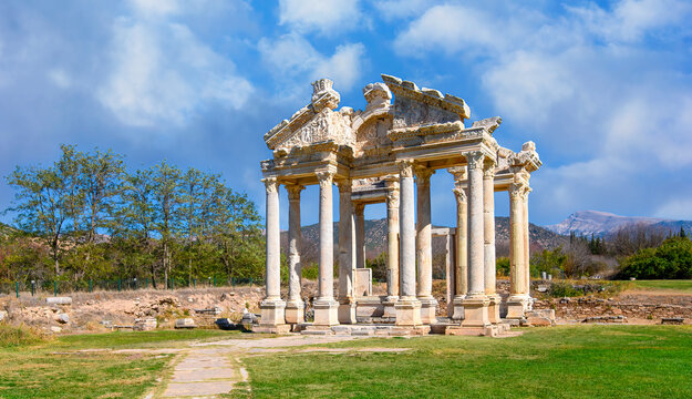 Aphrodisias Ancient city (Afrodisias) in Turkey. The ruins of The Tetrapylon, Monumental Gate. The city was named after Aphrodite, the Greek goddess of love