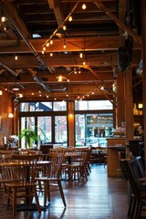 Fototapeta premium Cozy Cafe Interior with Exposed Beams and Warm Lighting