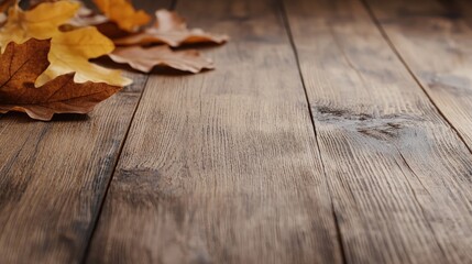 Naklejka premium Autumn Leaves on Rustic Wooden Surface
