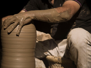 A potter keeping alive the ancient tradition of making pots or pottery using his bare hands. Pottery sculpting is one the many ancient dying industries and need help. It is 100% environmental friendly