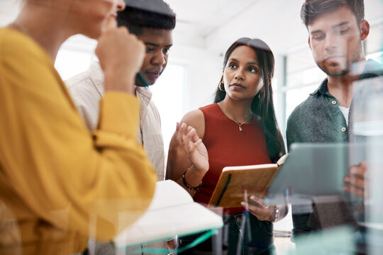 Teamwork, diversity and tablet in planning or workshop in boardroom, office or business as startup. People, technology and meeting in company with notebook, discussion and brainstorming as colleagues