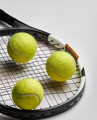 tennis racket and balls