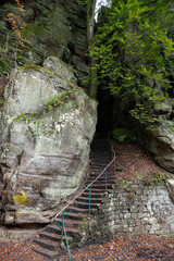 Scenic diversity of Mullerthal, Luxembourg's Little Switzerland, hiking routes, rock formations, moss-covered forests, tourist destination in Europe