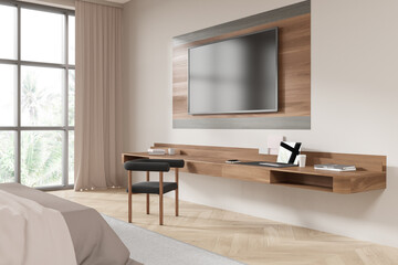 Elegant home bedroom interior with tv display, work desk and panoramic window