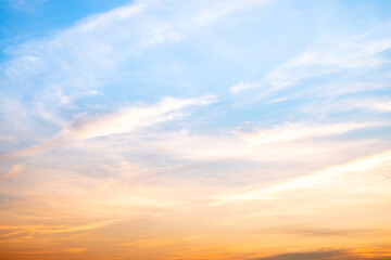 Fototapeta premium Beautiful , luxury soft gradient orange gold clouds and sunlight on the blue sky perfect for the background, take in everning,Twilight, Large size, high definition landscape photo