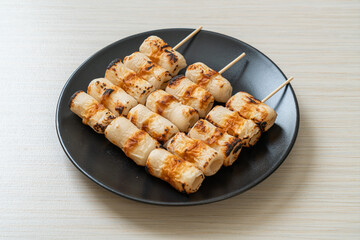 grilled tube shaped fish paste cake skewe or tube squid skewer