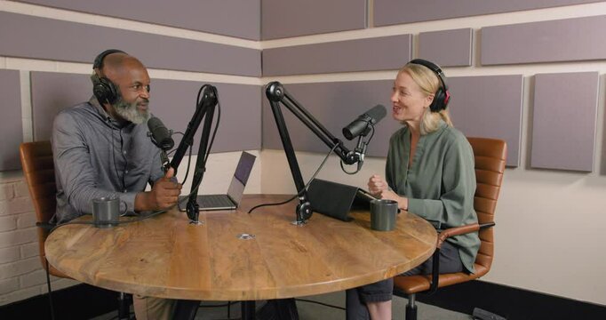 Podcaster in Studio Recording Business podcast Interviewing CEO