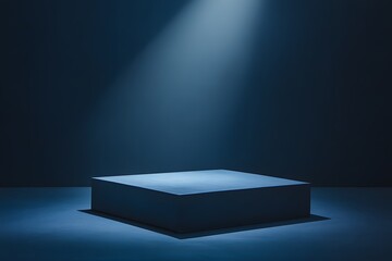 Minimalist dark blue pedestal illuminated by spotlight in empty studio, clean stage for product display or showcase, modern abstract interior with dramatic lighting and shadows