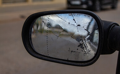 Broken side mirror of a car