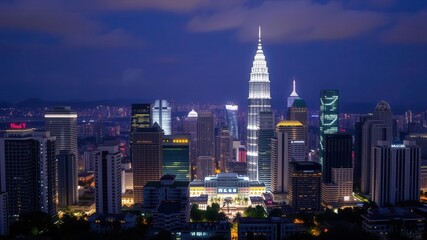 Obraz premium Kuala Lumpur night skyline with bright city lights, skyscrapers, urban, Kuala Lumpur