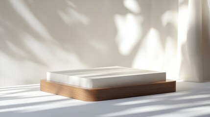 Square podium with wood and white surfaces for sleek, minimalist product photography.