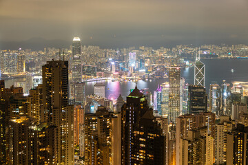 Obraz premium HONG KONG - MAY 5, 2024: Hong Kong city night view from Victoria Peak