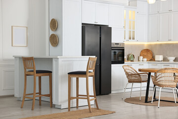 Stylish kitchen with bar stools. Interior design