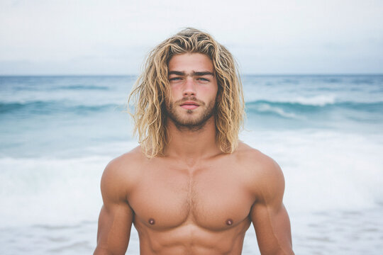 handsome blond man relaxing at the beach - Powered by Adobe