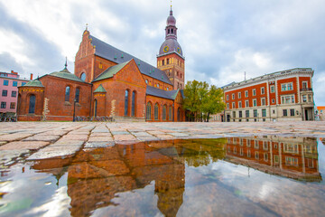 Obraz premium Old street in old Riga. The city is capital of Latvia that is well known to be a very popular tourism destination in the Baltic region