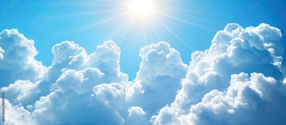 Leinwandbilder white cumulus clouds illuminated by bright sunlight drifting in a blue sky. with copy space image. p