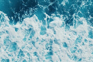 Obraz premium View from above of blue sea waves, white foam, top view
