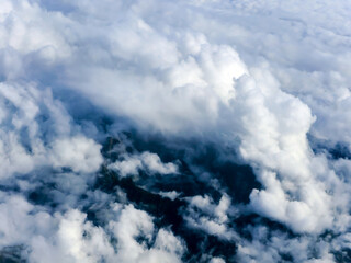 Blue sky white fluffy clouds background. Beautiful blue sky and white cumulus clouds abstract background.  