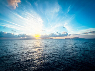 Naklejka premium ship sunrise in the ocean