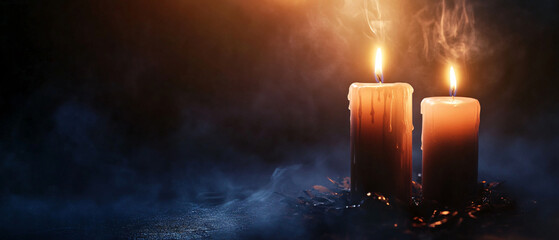 Two Burning Candles in Smoky Dark Background  Halloween Mood