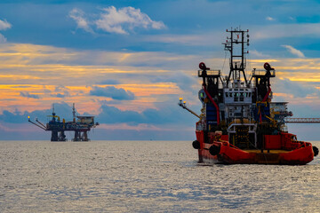 Oil and gas rigs in the middle of the ocean, oil exploitation projects at sea, industrial cargo...