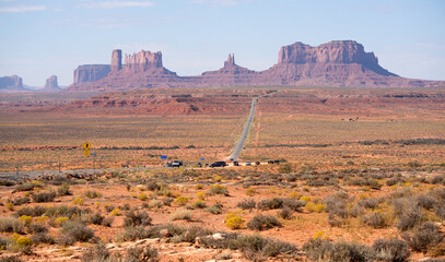 red, brown, and yellow rock formations of hematite, iron oxide in Monument Valley, Arizona USA