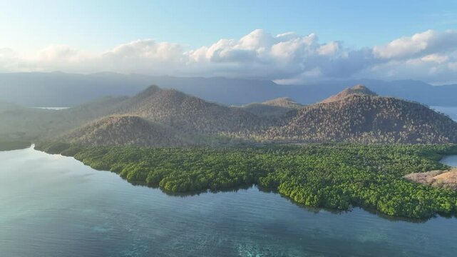 Morning light illuminates the scenic island of Lembata in Indonesia. This vast area, within the Lesser Sunda Islands, is part of the Ring of Fire and the Coral Triangle.