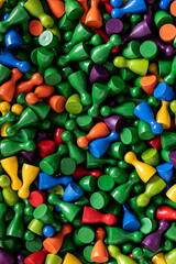 Playful Patterns: Colorful gamefigurines on a green dominant background
