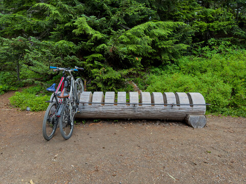 Fototapeta Wooden Bike Rack and Two Bikes In Mount Rainier