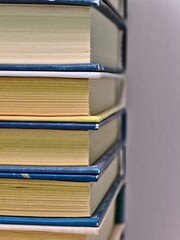 Teaching. Old books. Buying books at a discount. Black Friday. Stack of old books. Home library. Learning, education, research, reading books. Close-up photo