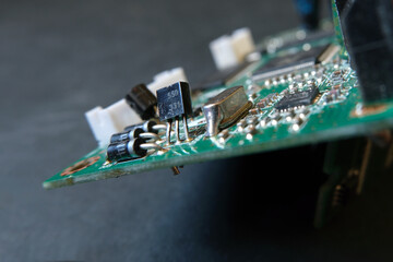 Soldered electronic components on circuit board. Focused on semiconductor elements that diode and...