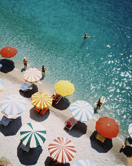 Hyperrealistic aerial view photo of umbrellas on the beach in the Mediterranean. Kodak Umbrellas are multicolored striped. Ektachrome. 120mm film. Hasselblad 500CM.