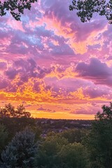 Obraz premium Vibrant Cloudy Sky with Shades of Pink and Orange