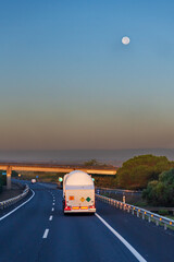 Tanker truck transporting oxidising gases, with ADR plates and labels, driving on a motorway under...
