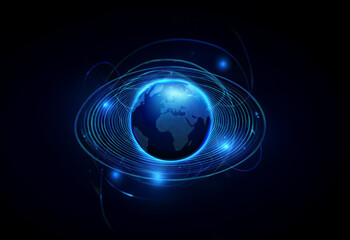 Obraz premium A glowing blue globe with swirling lines of light around it, set against a dark background.