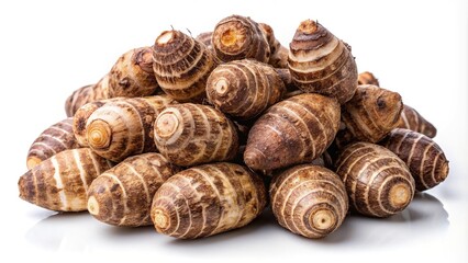 Fresh harvested taro root isolated on white background