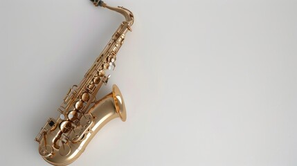 Gold-tone saxophone on a white background