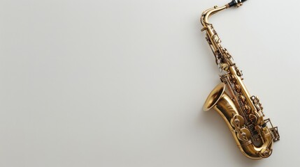 A Golden Saxophone Lying on a White Surface