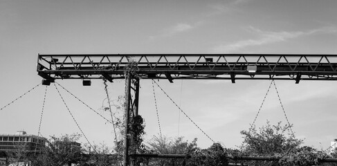 Overgrown metal beam