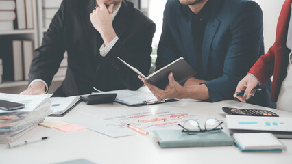 Group of business people collaborating during leadership team meeting, business meeting with manager. Discussion. Using TV presentation with statistics. growth chart big data Digital entrepreneurs wor