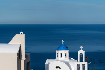 Santorini church and view towards the deep blue sea. Greece.