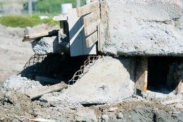 Urban Decay: Fragmented Concrete and Exposed Reinforcement