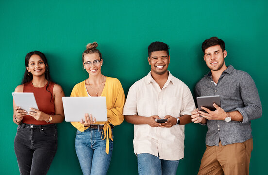 Business people, portrait or waiting room with technology for career or job opportunity on a green wall background. Young, group or creative interns with smile in row or line for startup or interview