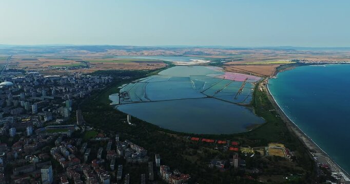 Clouds Shading Large Salt Flats Vibrant Blue Pink In Burgas Bulgaria High Altitude Aerial Orbit
