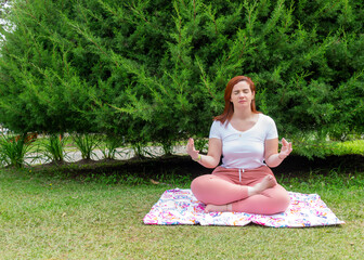Curvy Latina woman in Conscious Meditation in Nature