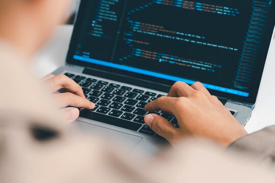 Digital technology, software development concept. Developing programmer, software developer coding computer code on laptop computer. Perfect for coding, IT solutions, applications, coding javascript