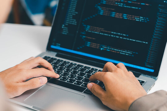 Digital technology, software development concept. Developing programmer, software developer coding computer code on laptop computer. Perfect for coding, IT solutions, applications, coding javascript