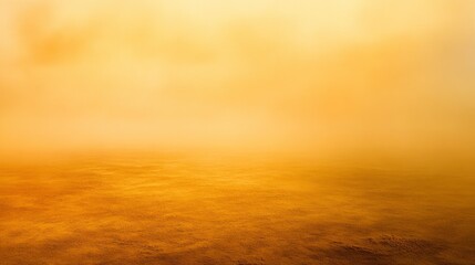 Obraz premium Serene landscape with golden hues and soft fog enveloping the ground