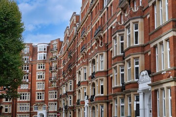 Fototapeta premium London, England, elegant old red brick apartment buildings