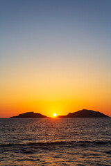 sunset between the islands